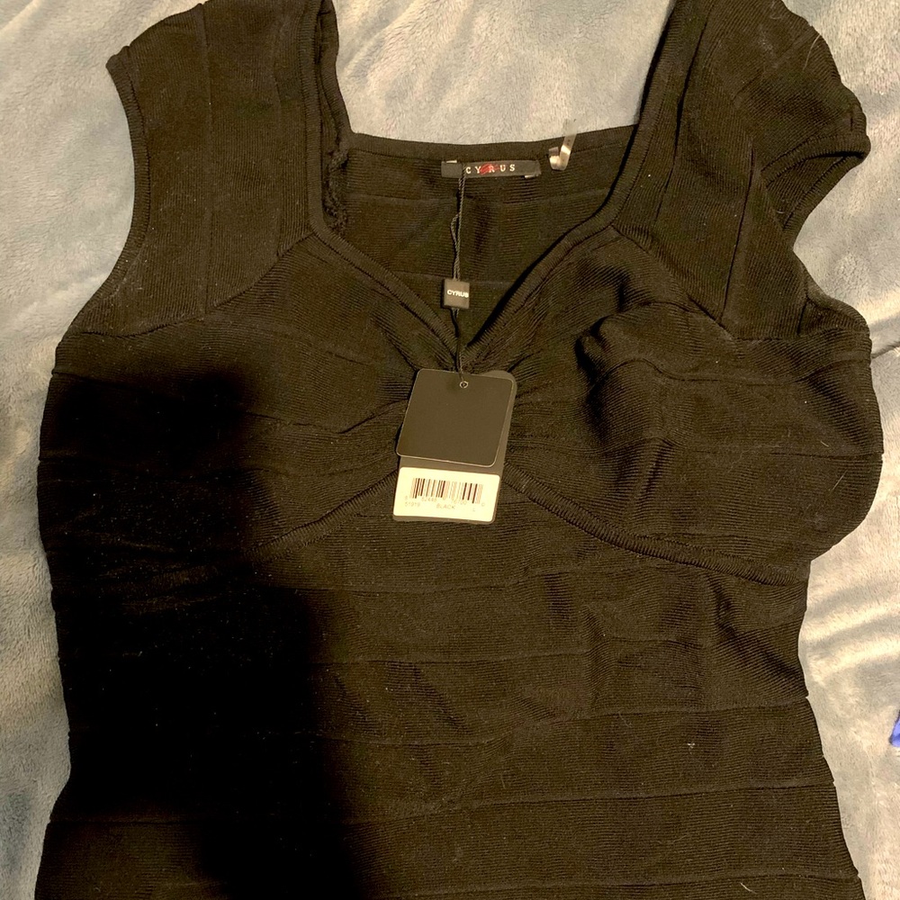 Large women’s top by Cyrus.